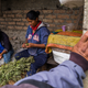 Women and children usually do the trim work, which involves cutting the leaves around the marijuana bud.